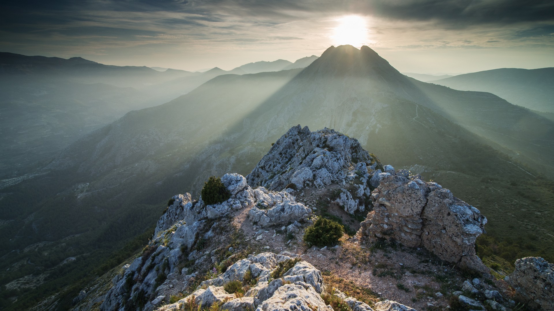 Sun sets behind Mallada del Llop